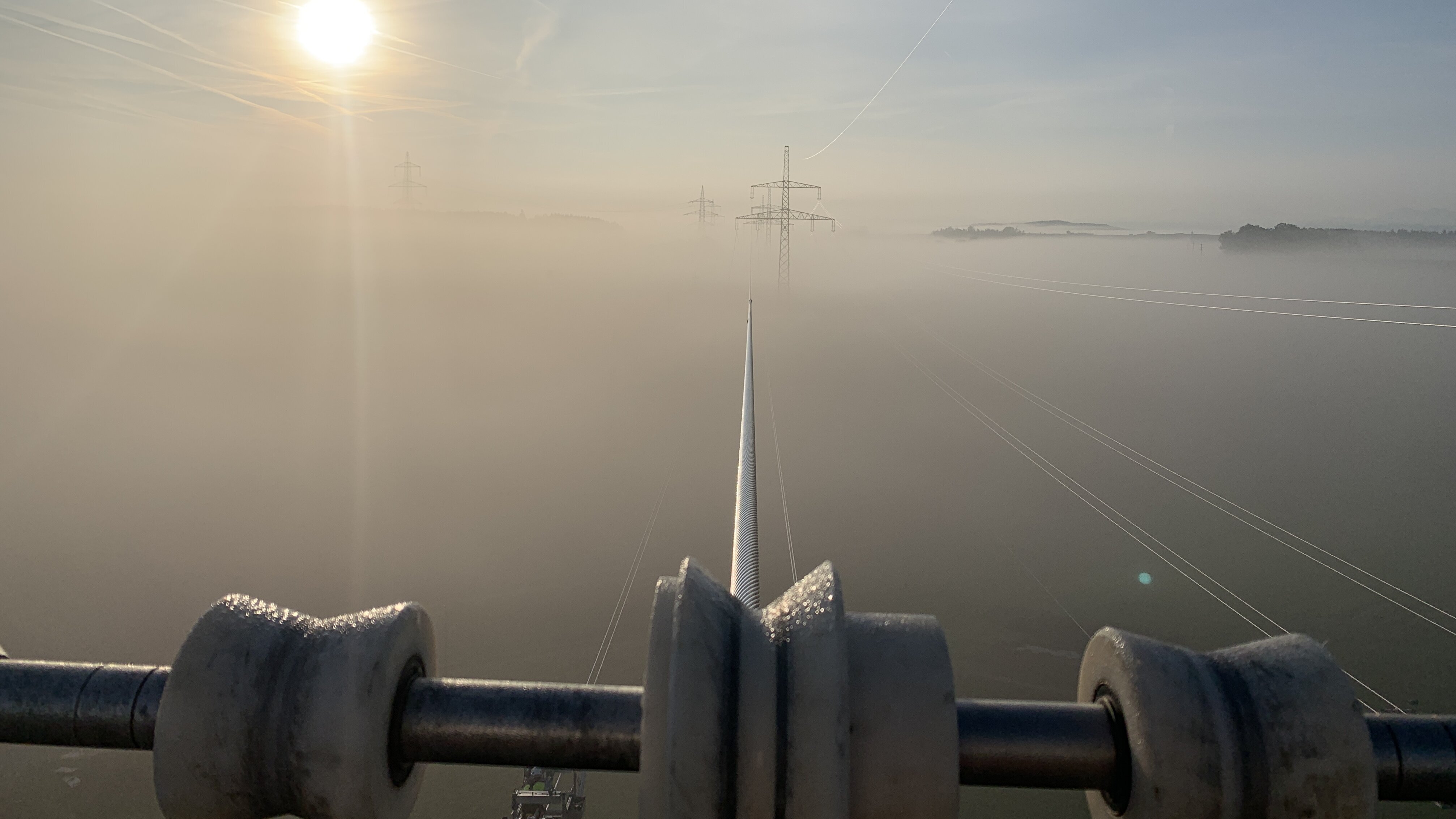 Transmission line - surrounded by fog